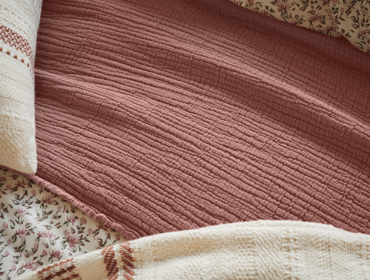 Topanga Matelasse Throw in Plum Blossom