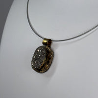 Golden Cabochon Pendant