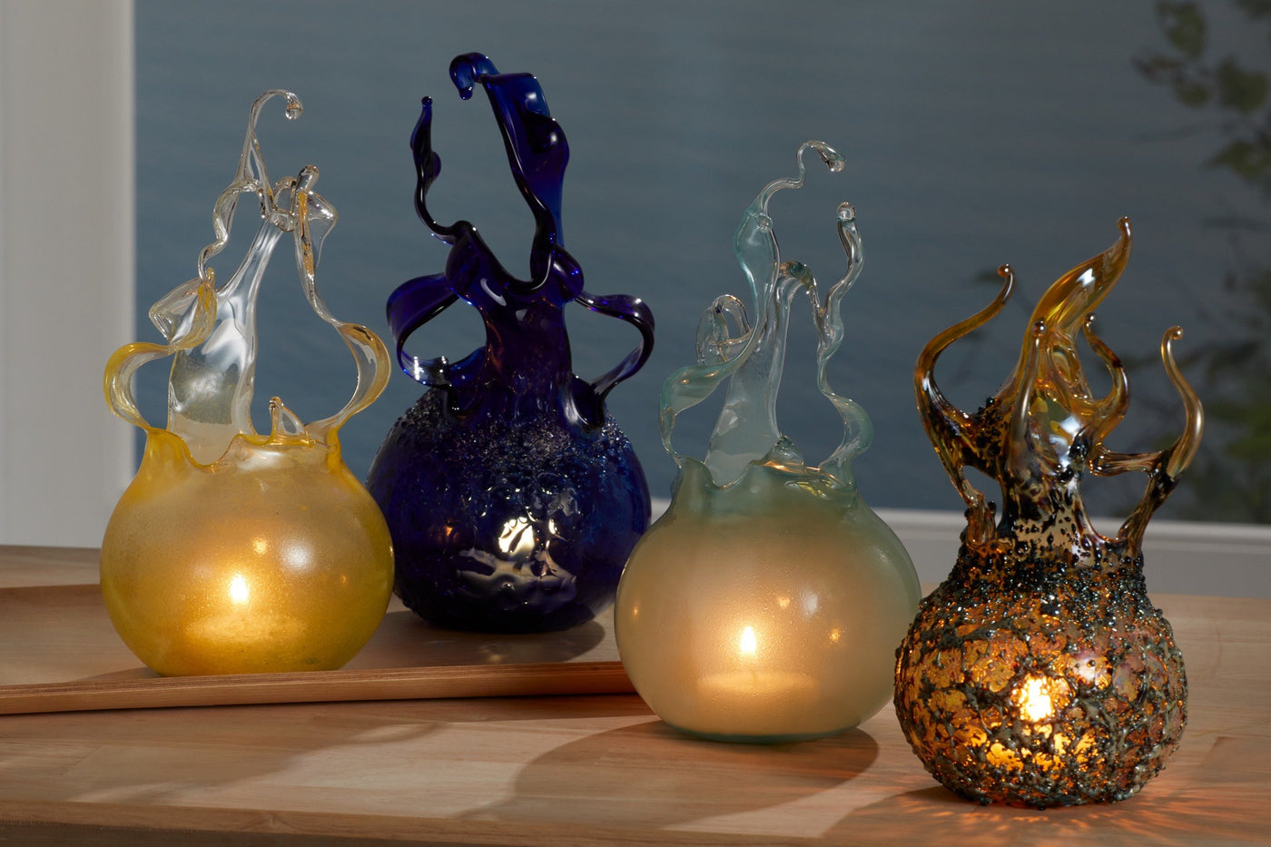 left to right: lemon lime raindrop, crystal cobalt raindrop, aqua raindrop, granite fireball