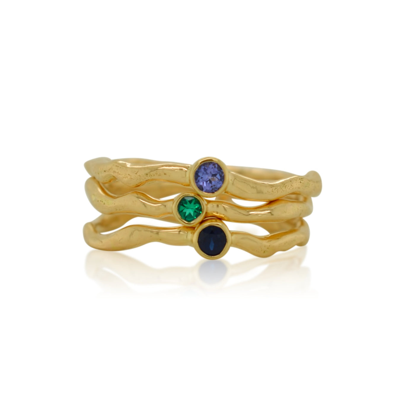 Top to Bottom: Tanzanite, Lab-grown Emerald, Black Diamond