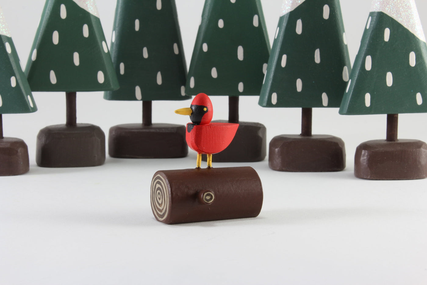 cardinal on a log