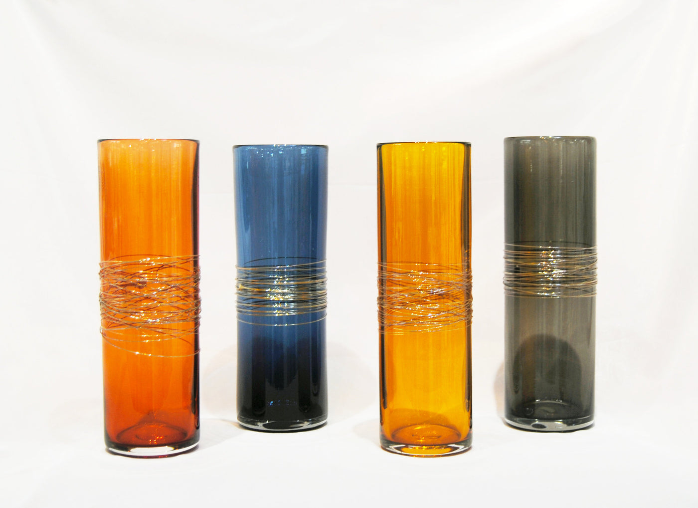 Left to right: Apricot, Steel Blue, Gold Topaz, Amber