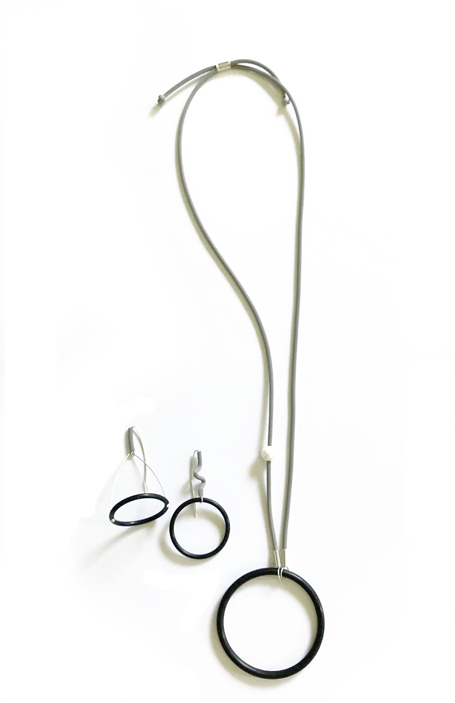 shown with big circle earrings