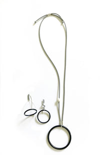 shown with big circle earrings
