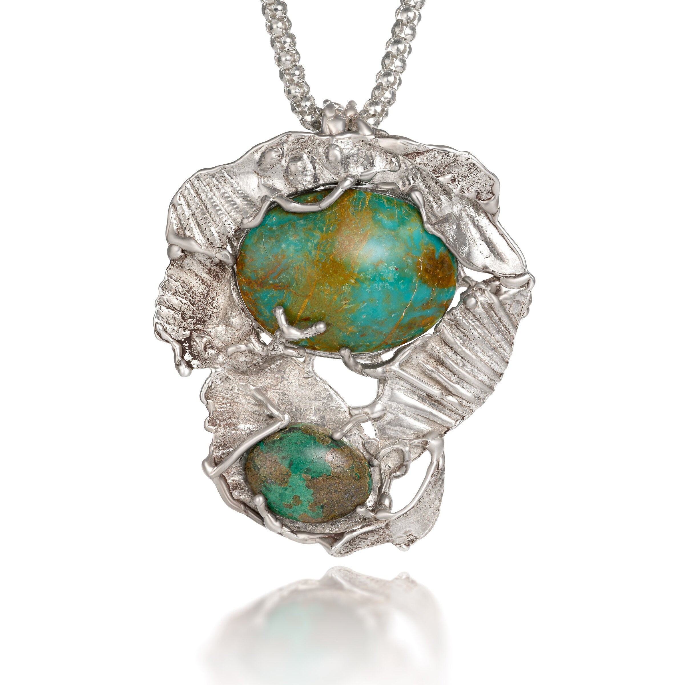 Double Turquoise Pendant | Photo by Berlian Arts
