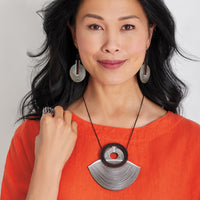 shown with the area 51 earrings and Mirage Necklace by Karole Mazeika