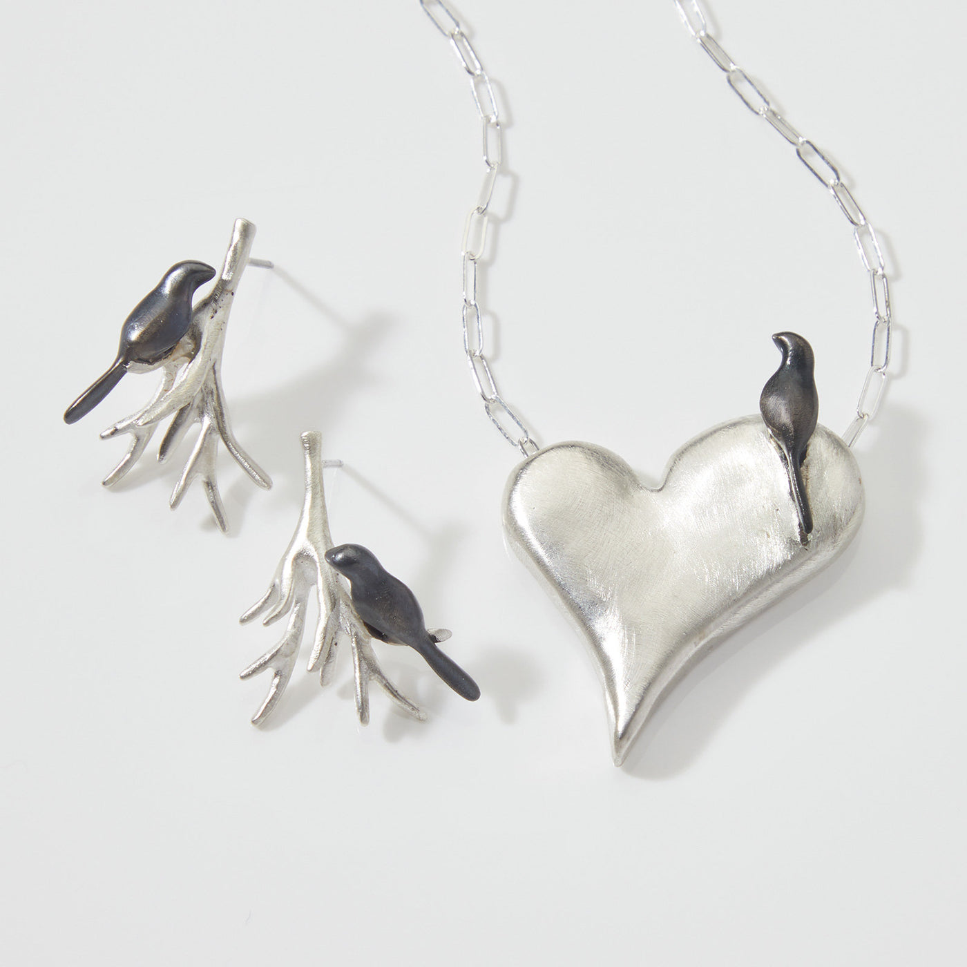 shown with Root Cluster with Perched Black Bird Post