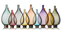 left to right: tall tourmaline, short aubergine, tall gray, short straw, tall tea, short mist, tall indigo, short smoky topaz, tall sage