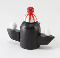 Penguin with Snowballs