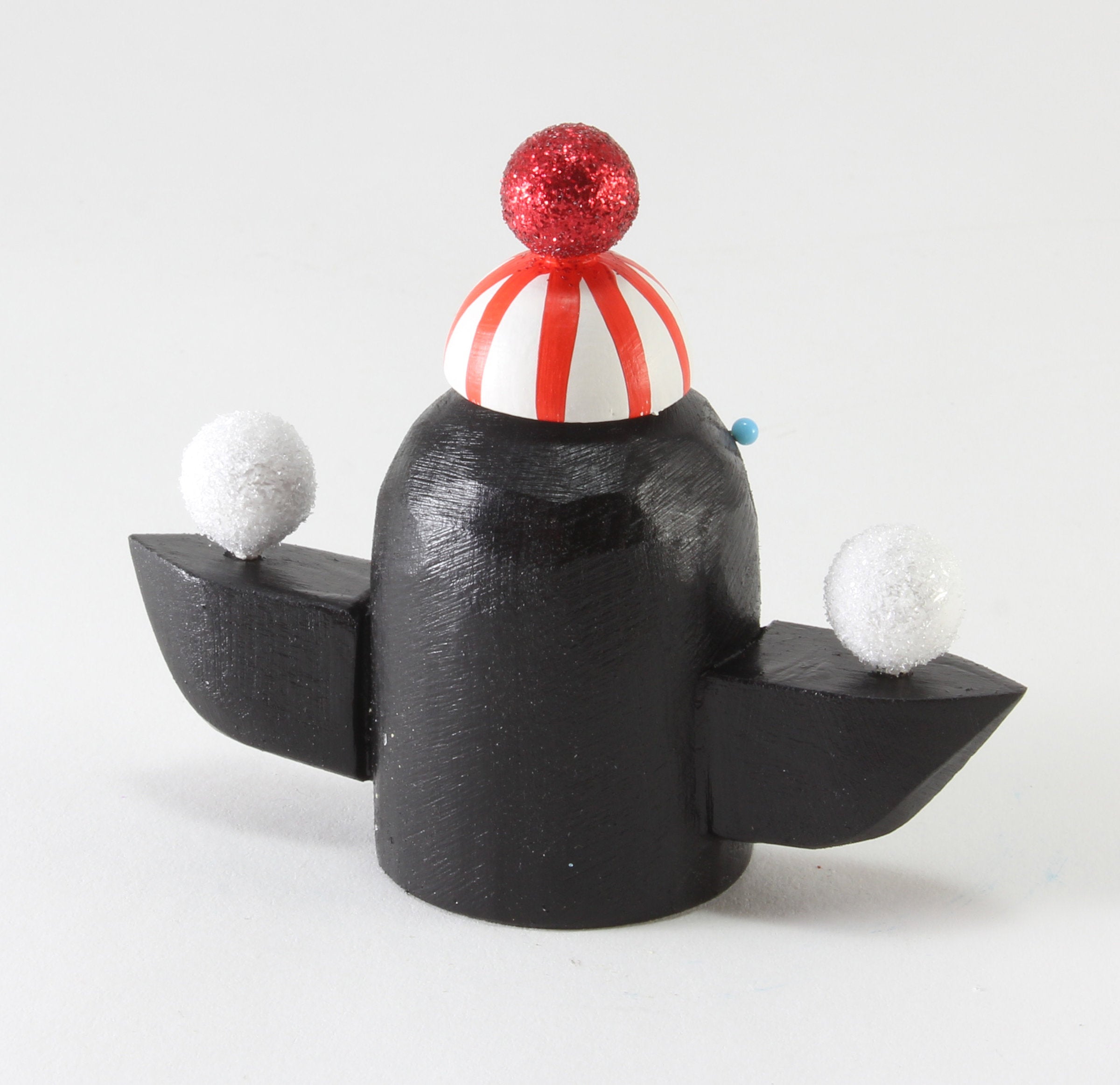 Penguin with Snowballs