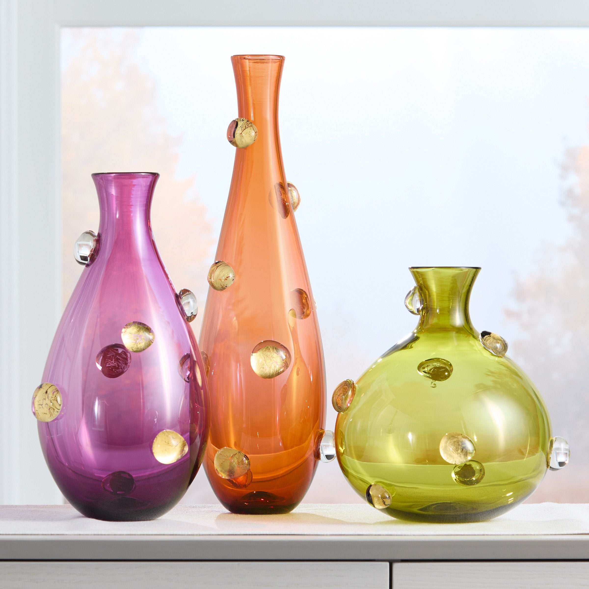 left to right: amethyst, apricot, olive green