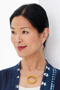 shown with the circle necklace by melissa stiles