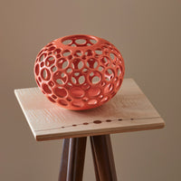 Shown with Openwork Orb by Lynne Meade