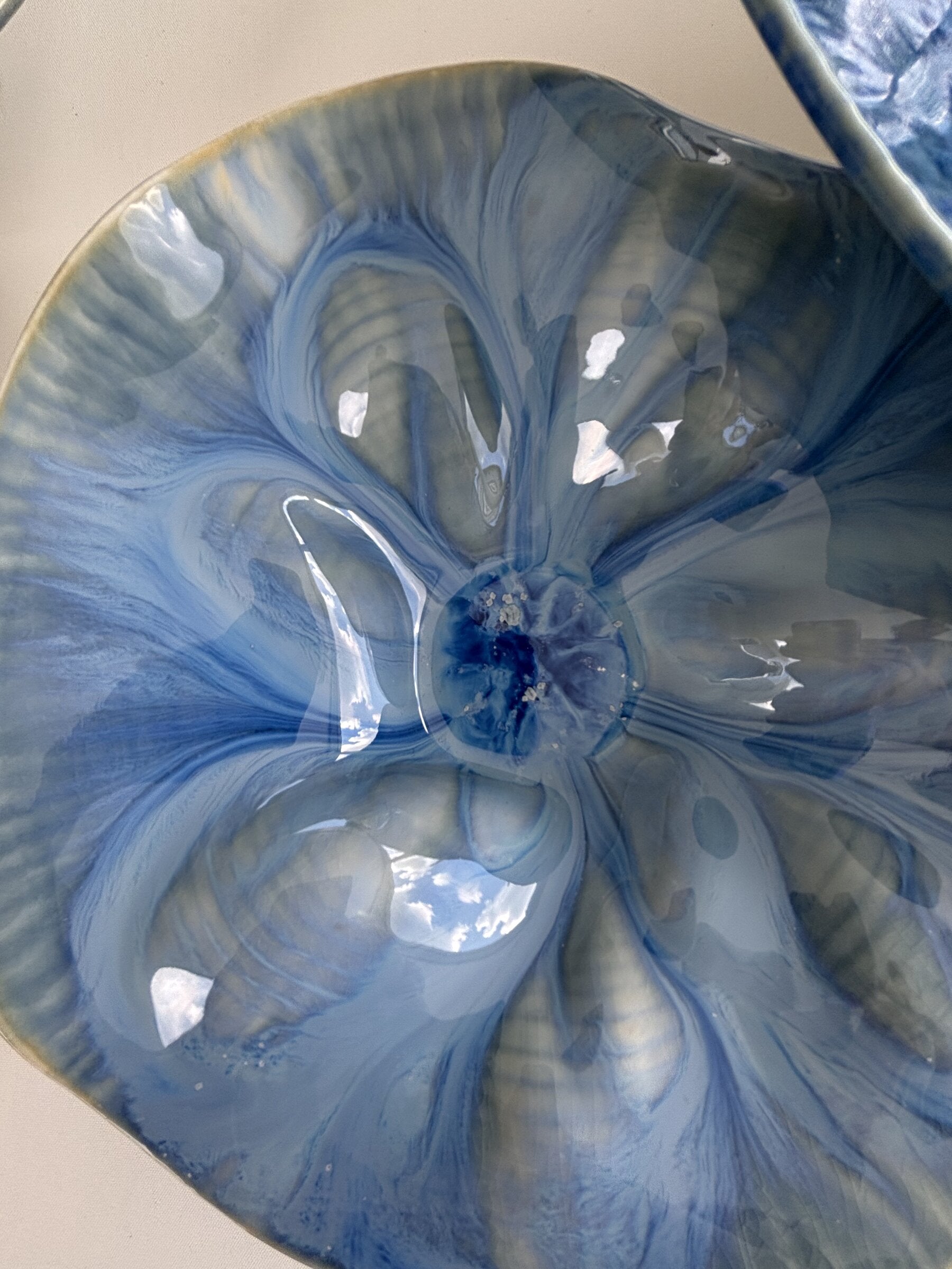 Porcelain Wall Installation with Deep Teal Crystalline
