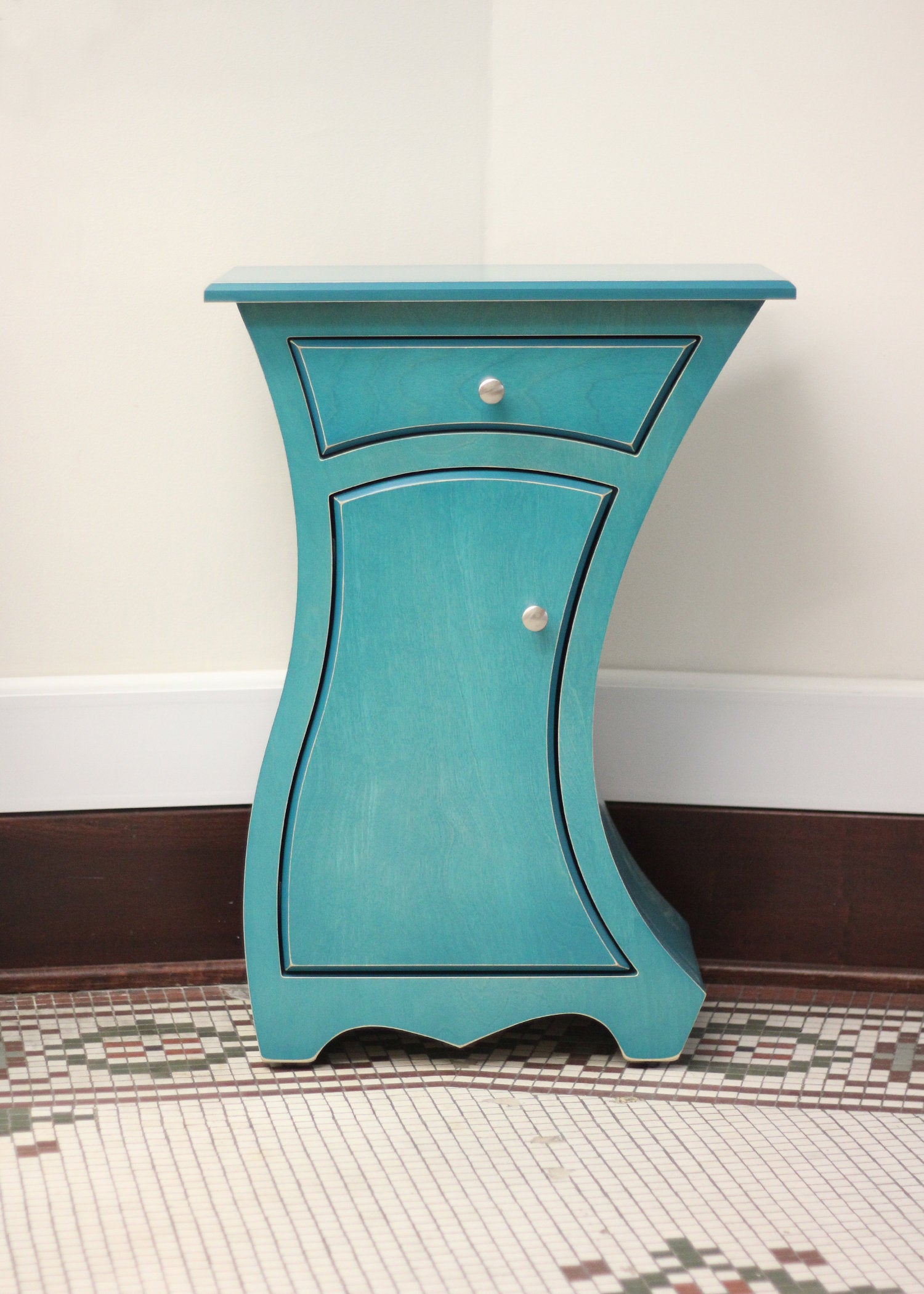 left-handed, turquoise stain