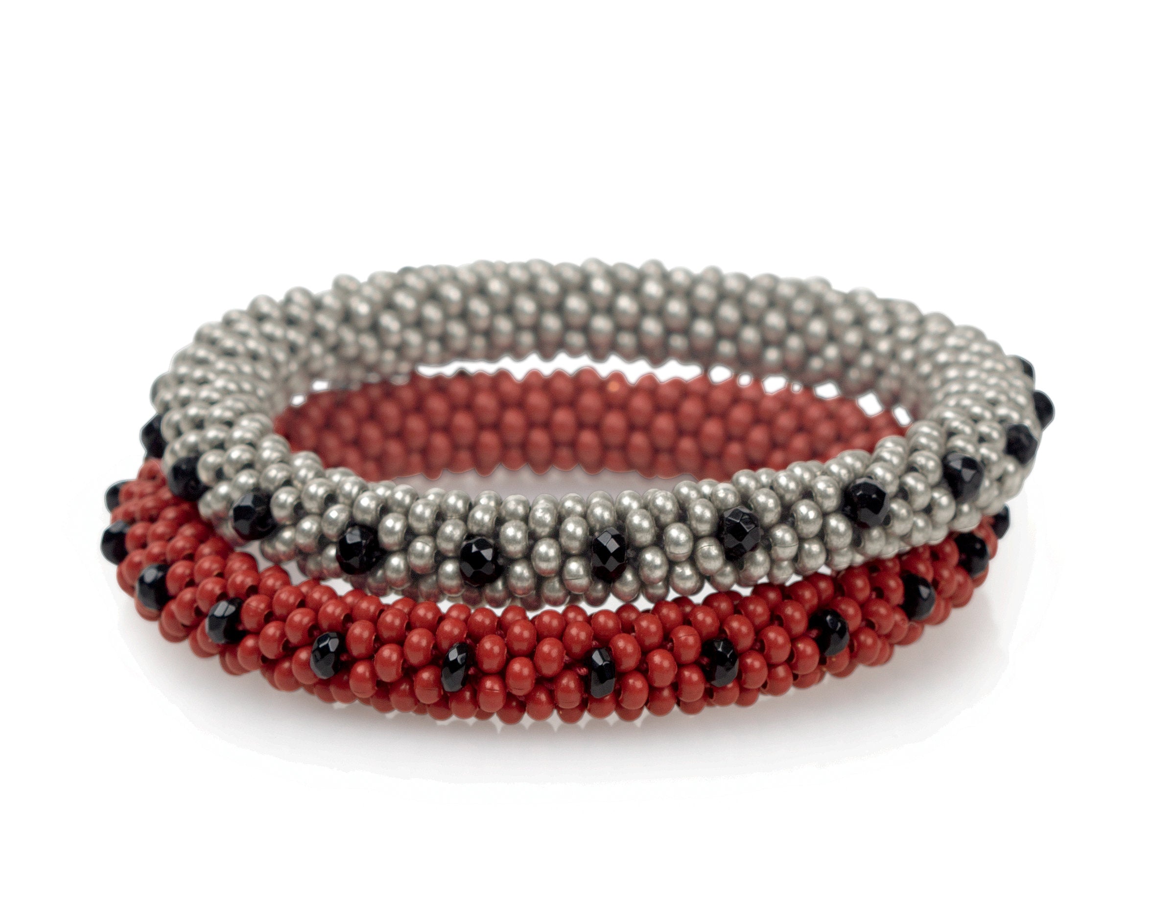 Silver Oxide (top), Red Enamel (bottom)