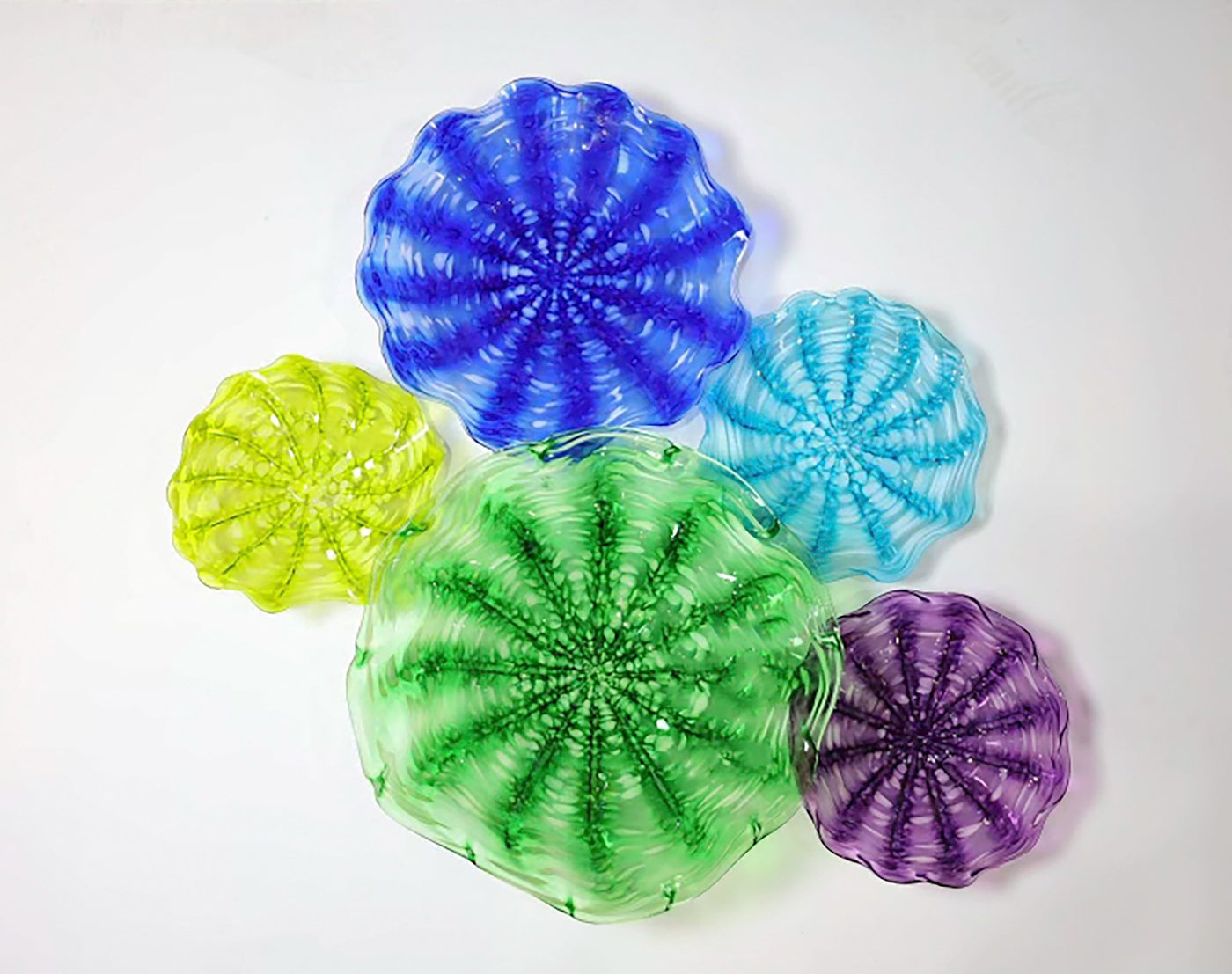 Clockwise from top: Cobalt blue medium, Teal small, Purple small, Green large, Lime green small