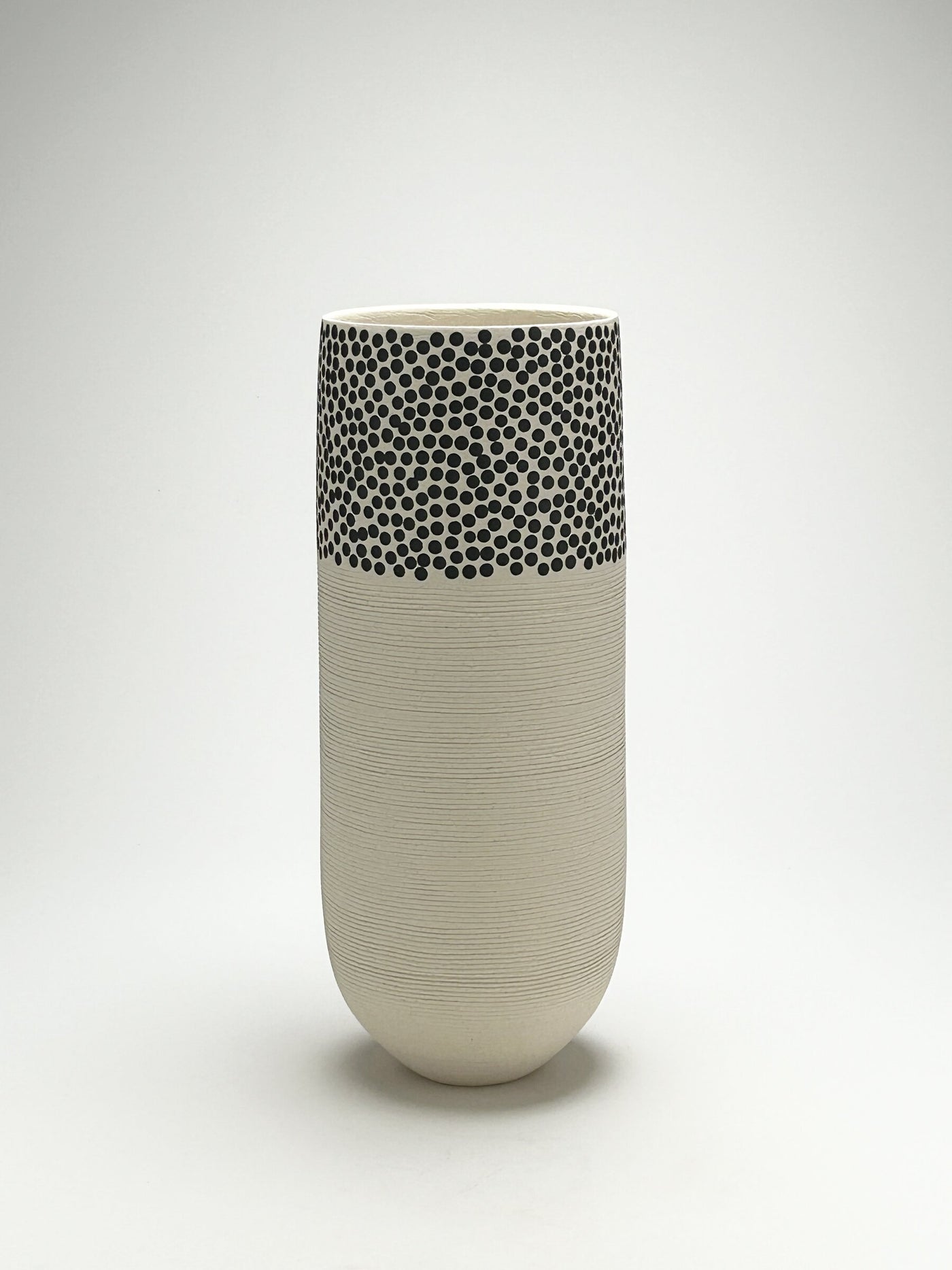 Black and White Tapered Vessel