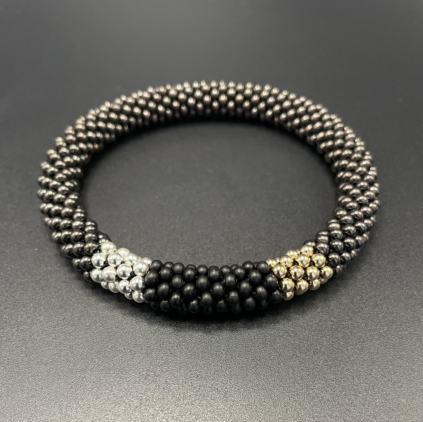 Gunmetal, Silver, and Gold Bangle