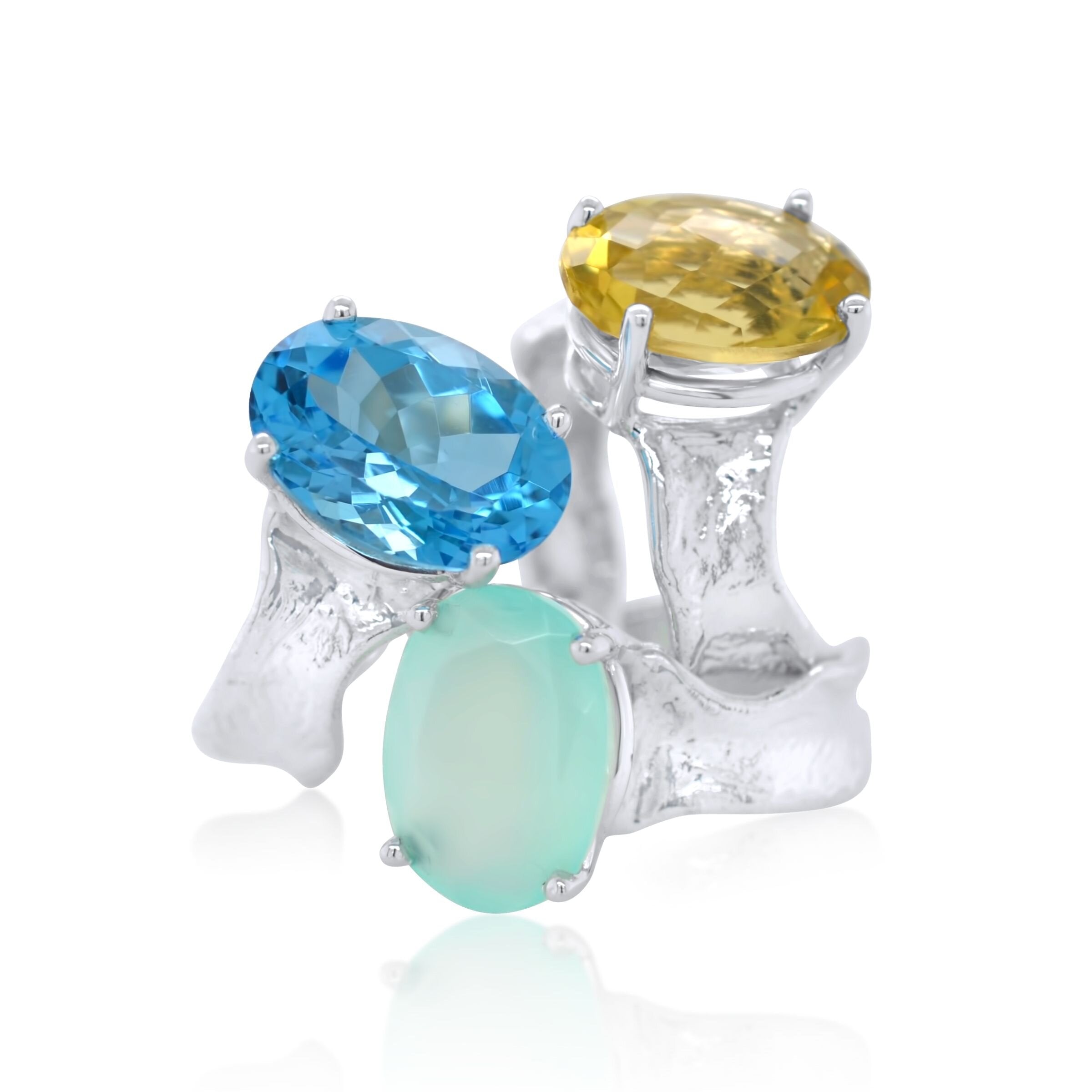  Swiss Blue Topaz (Left), Peru Chalcedony (Center) and Lemon Quartz (right)