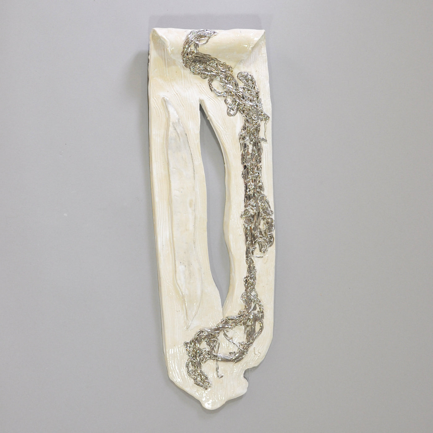 White Wall Sculpture With Silver Accents