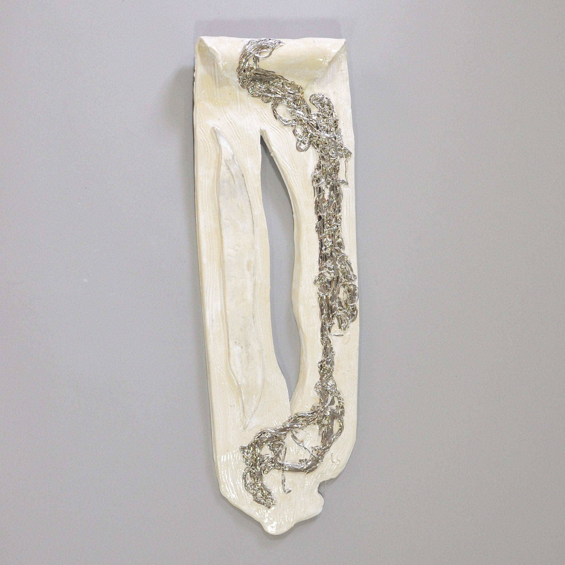White Wall Sculpture With Silver Accents