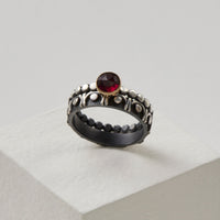 shown with the gemstone solitaire ring in garnet