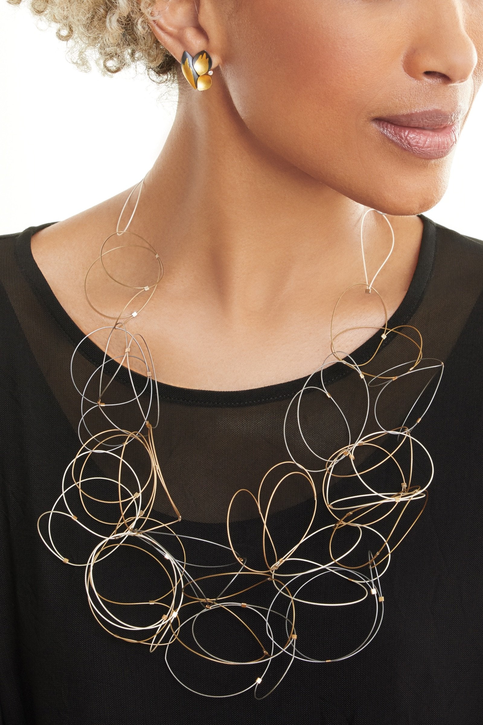 cool colors, shown with the Diamond Petals Earrings by Judith Neugebauer