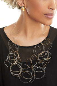 cool colors, shown with the Diamond Petals Earrings by Judith Neugebauer