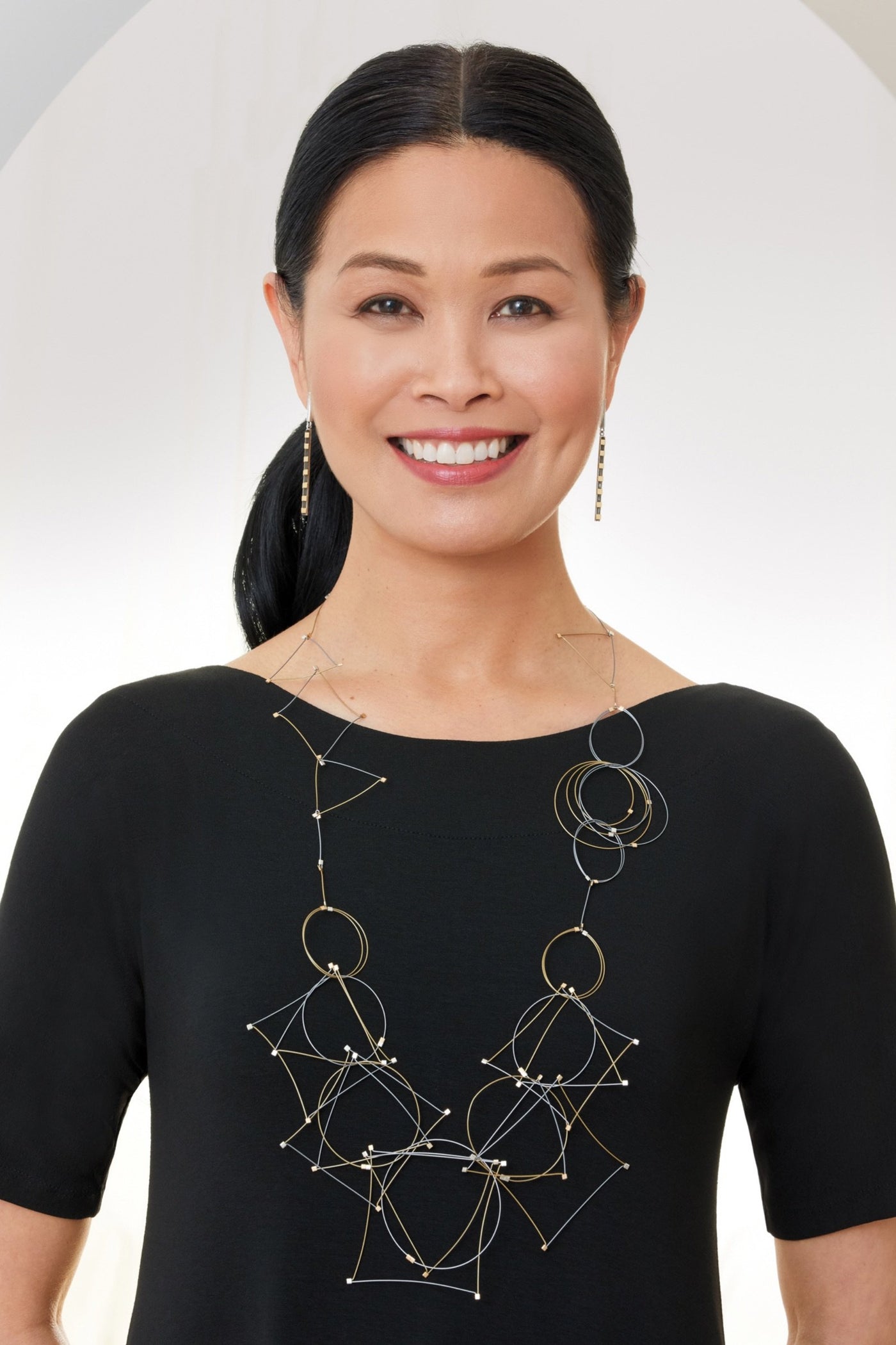 gold and steel shown with Furrow Dangles with Gold Bars by Lisa D'Agostino