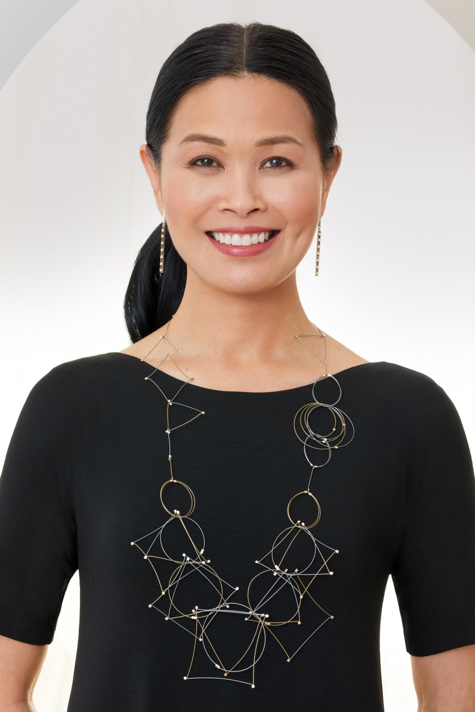 gold and steel shown with Furrow Dangles with Gold Bars by Lisa D'Agostino