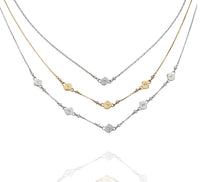 Single Spiral Necklace in Argentium Silver, Triple Spiral Necklace in 14k Yellow Gold, and Five Spiral Necklace in Argentium Silver 