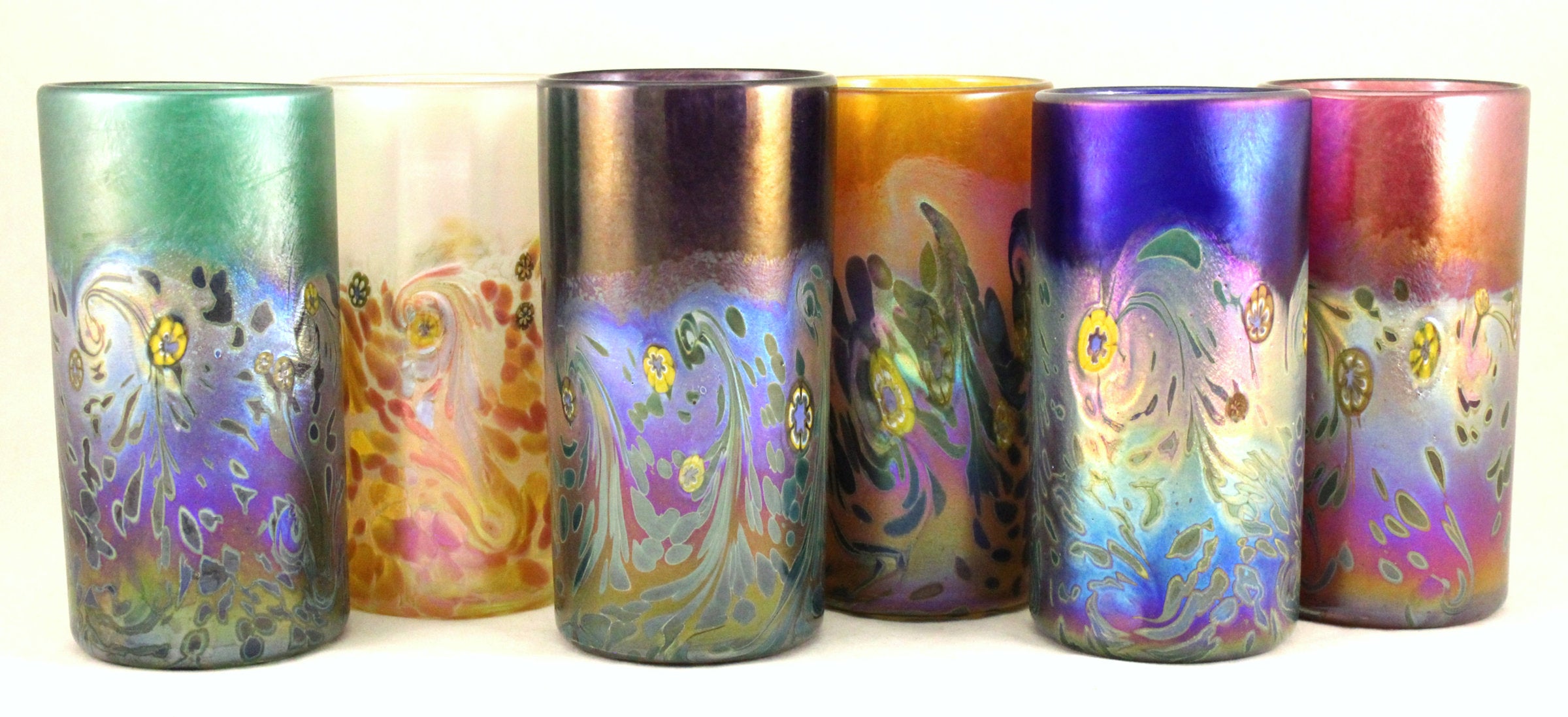 left to right: emerald green, clear/white, hyacinth purple, gold topaz, cobalt blue, ruby