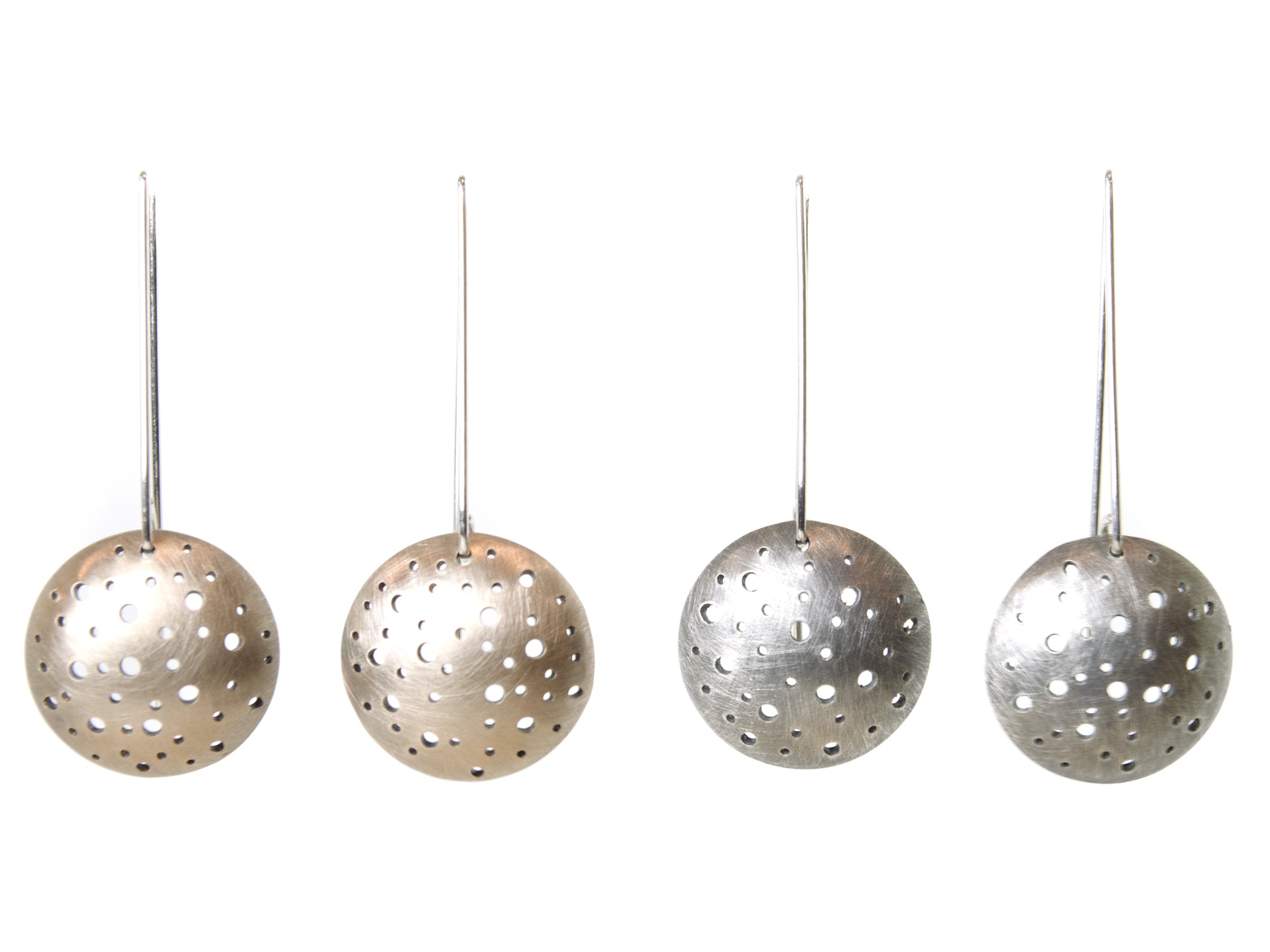 left to right: bronze, oxidized silver