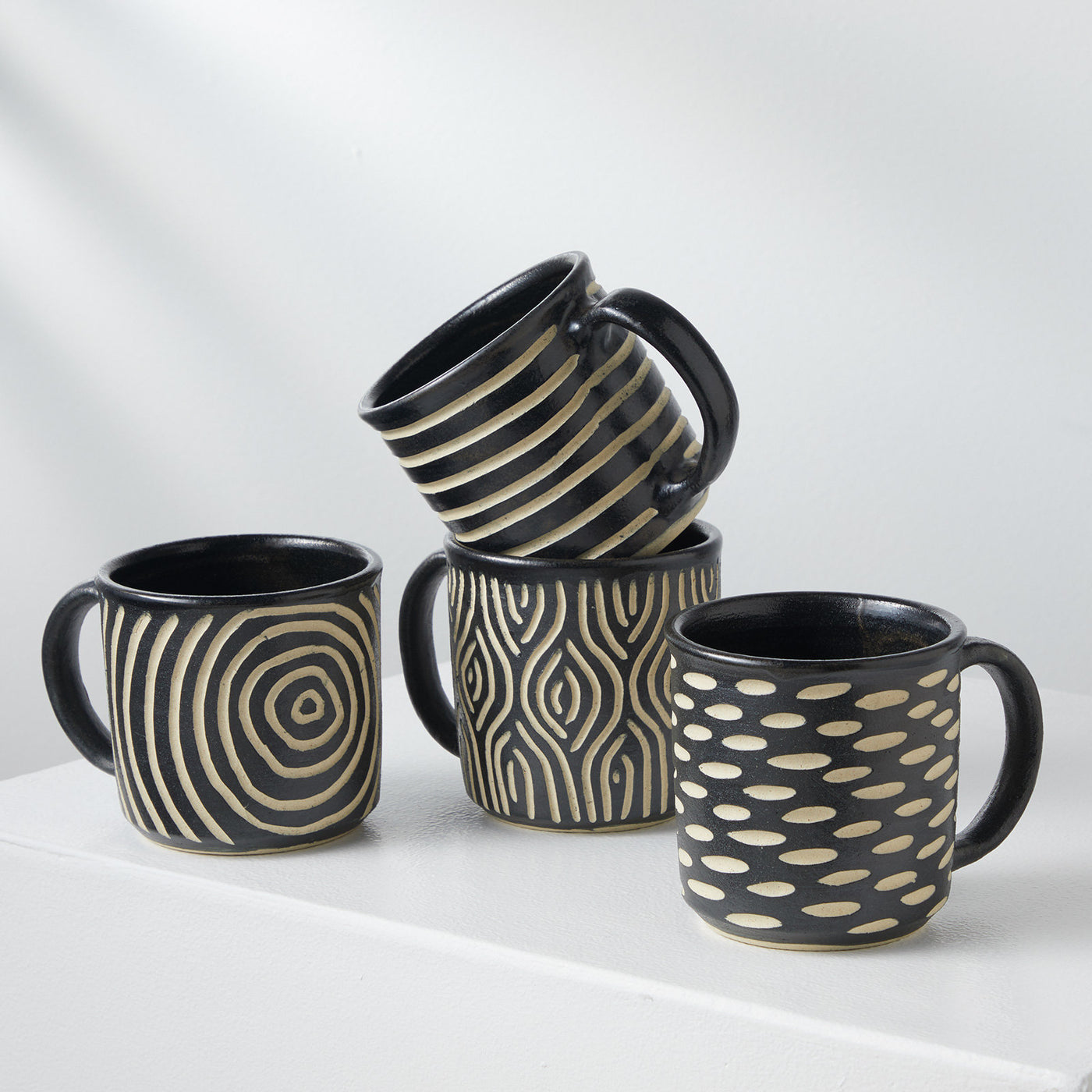 left to right: bullseye, horizontal stripes, woven, dashes