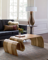 shown with the crazy carpet table in sweetgum by kino guerin