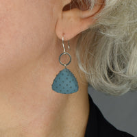 Dark teal with dots