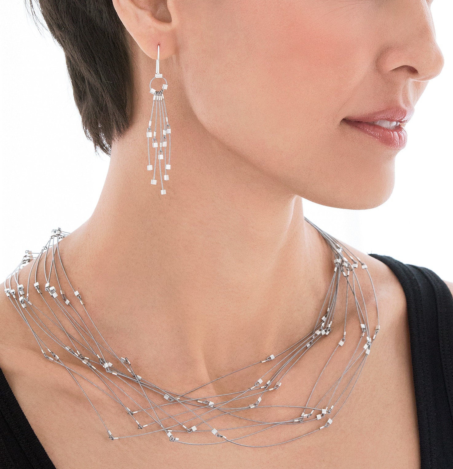 18" Steel shown with line segment earrings