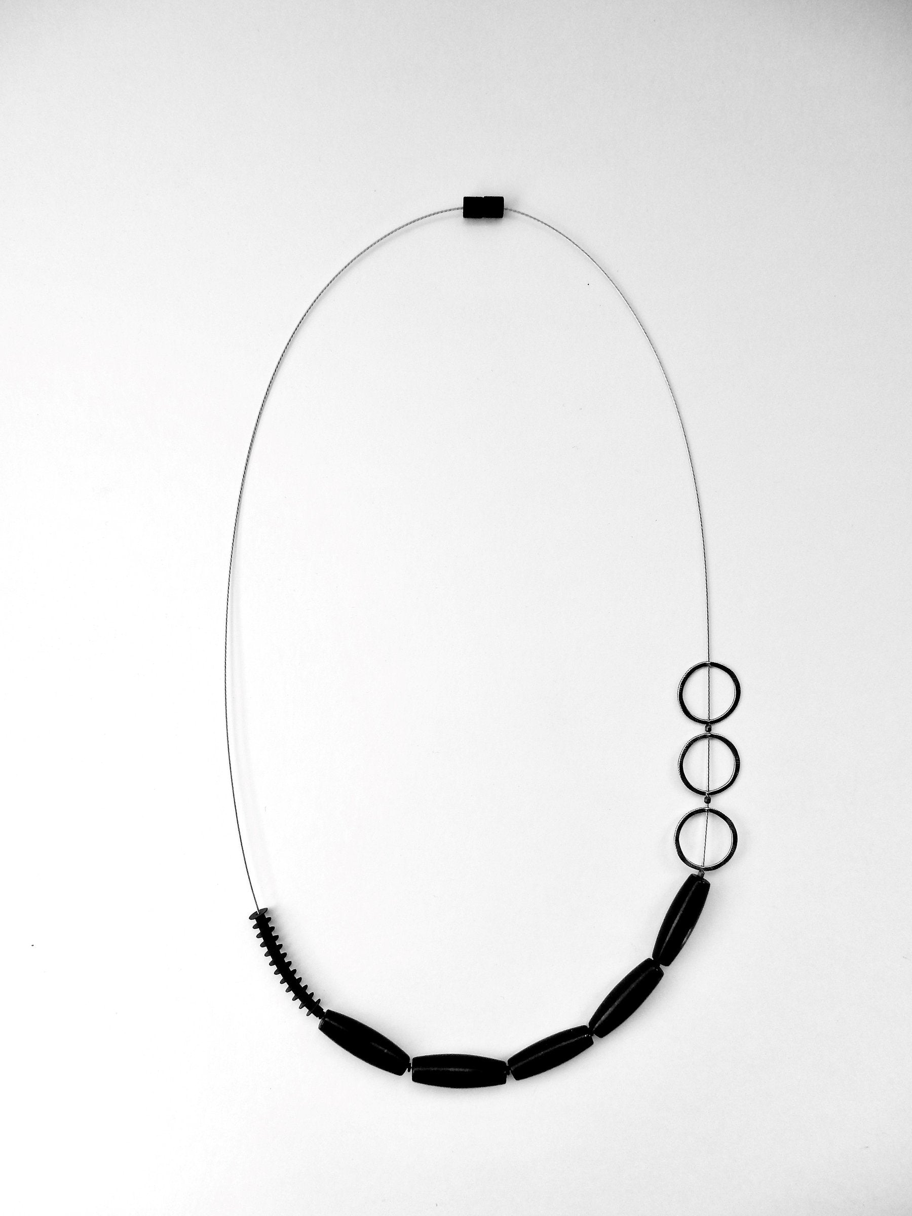 Silver, Blackstone, and Rubber Necklace on Stainless Steel Cable