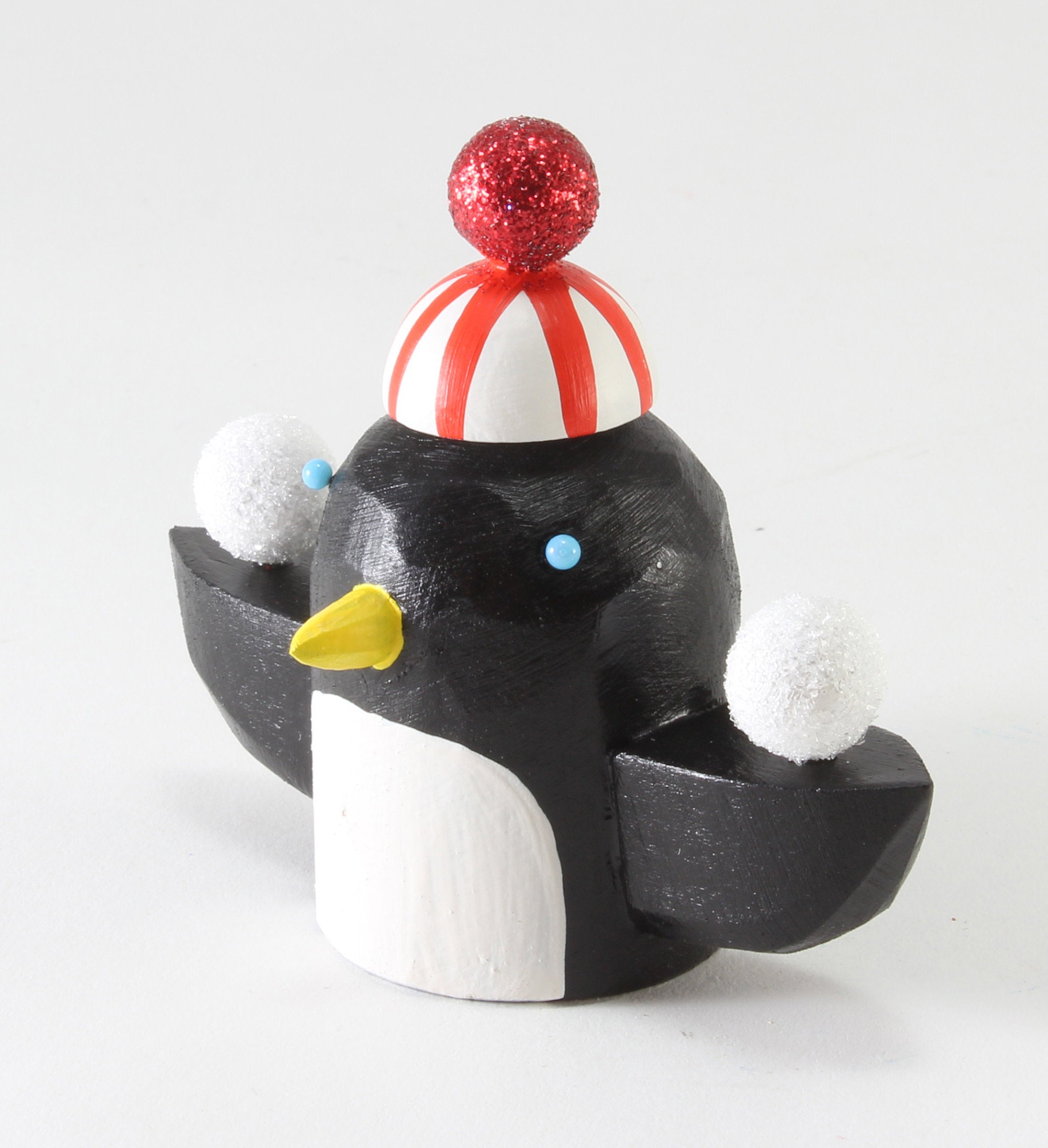 Penguin with Snowballs