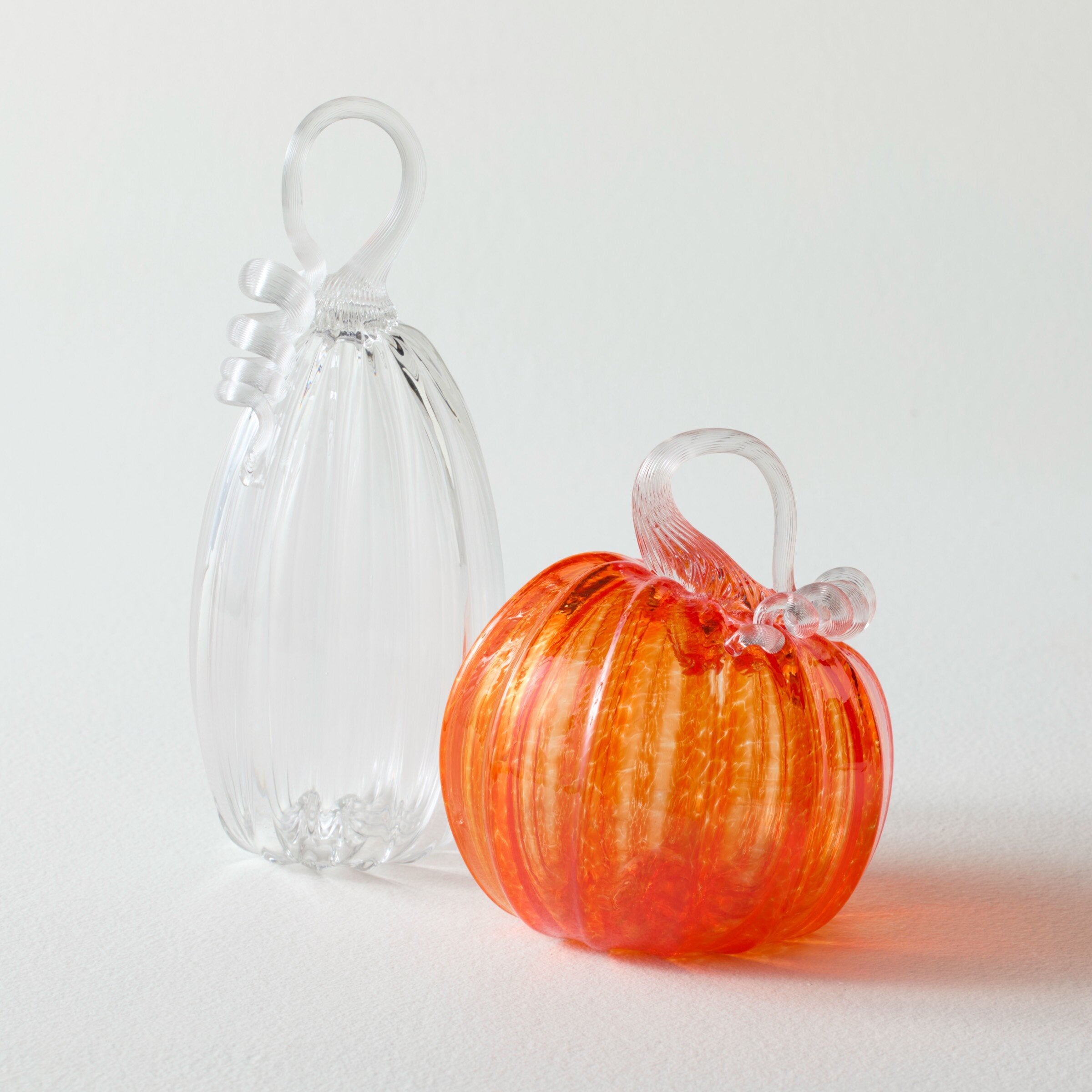 clear gourd, orange pumpkin
