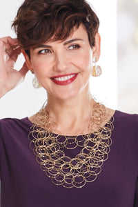 shown with Pocka Dots Earrings by Sana Doumet