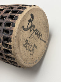 Black and Red Carved Vessel