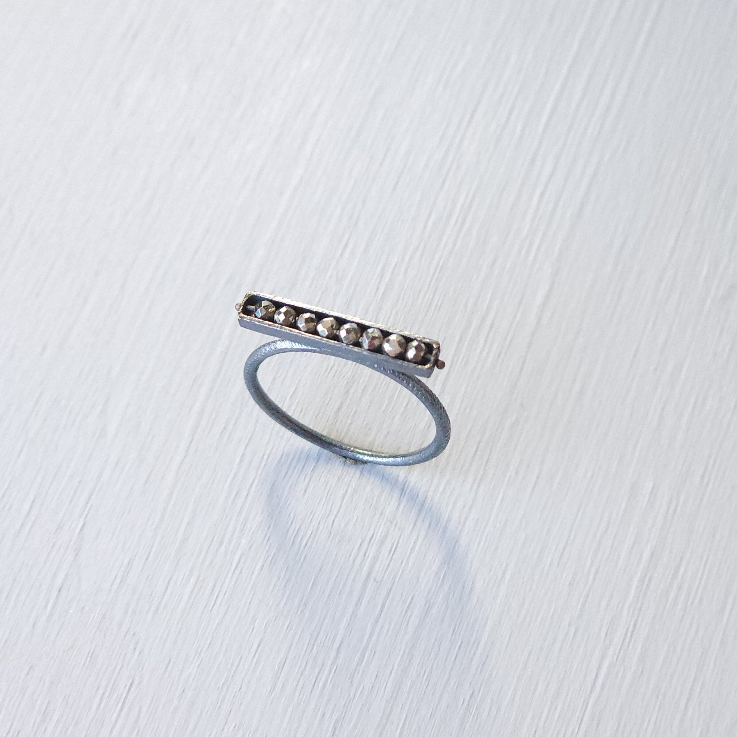 Horizontal Eight Stone Segment Stacking Ring