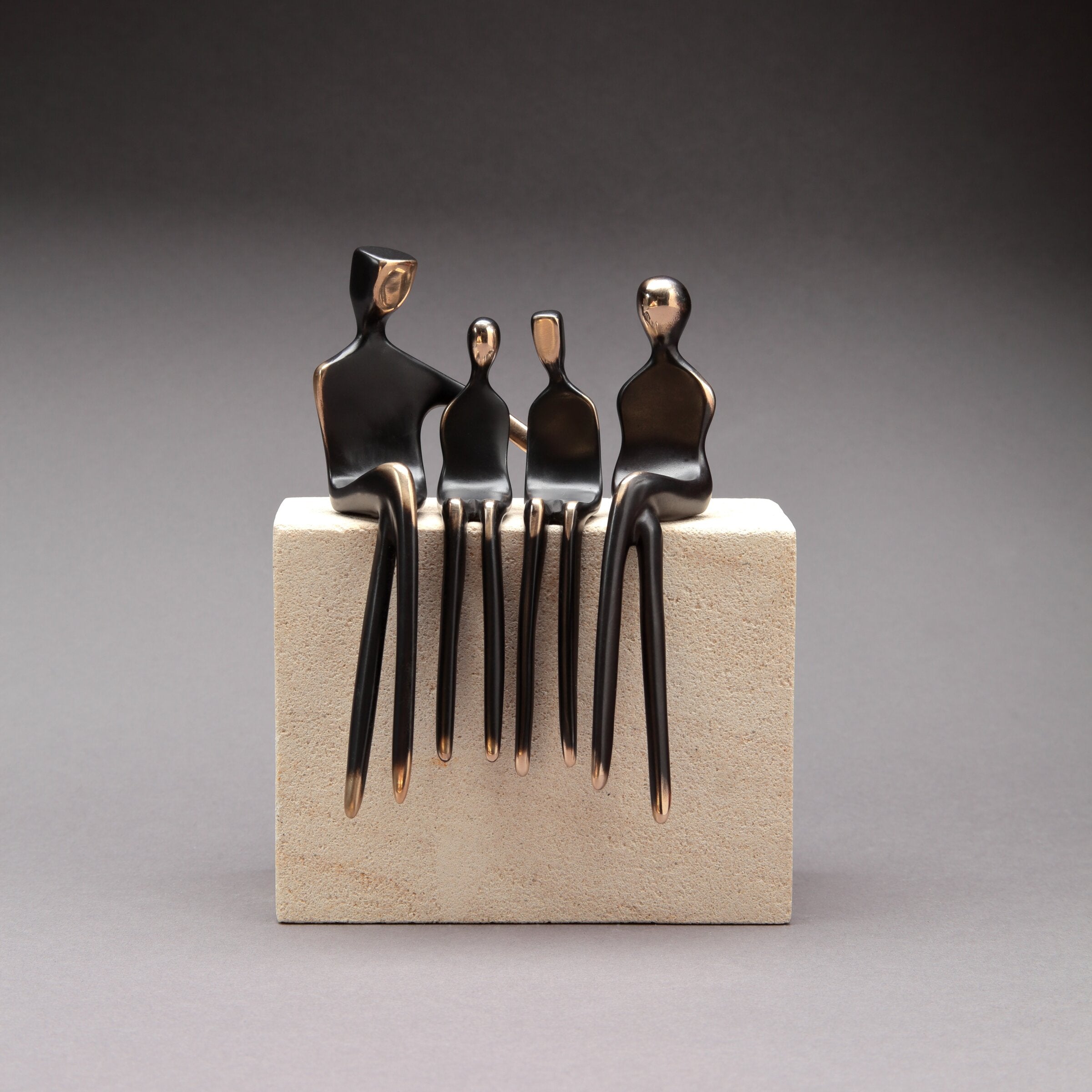 Family of Four Conversation Mounted on Limestone