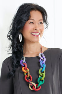 shown with the Carved Arch Slot Earrings by Heather Guidero