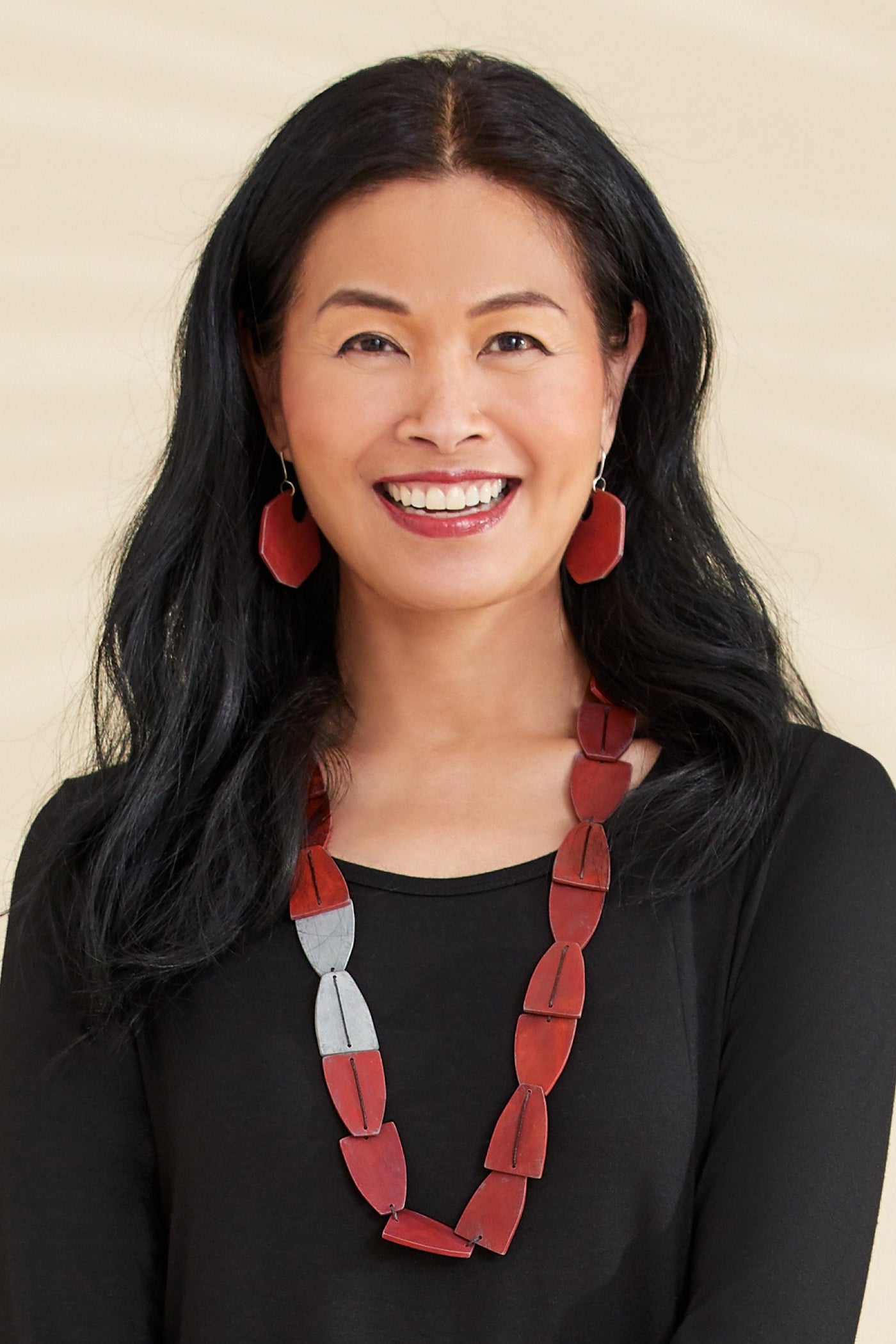 red, shown with the longest year necklace