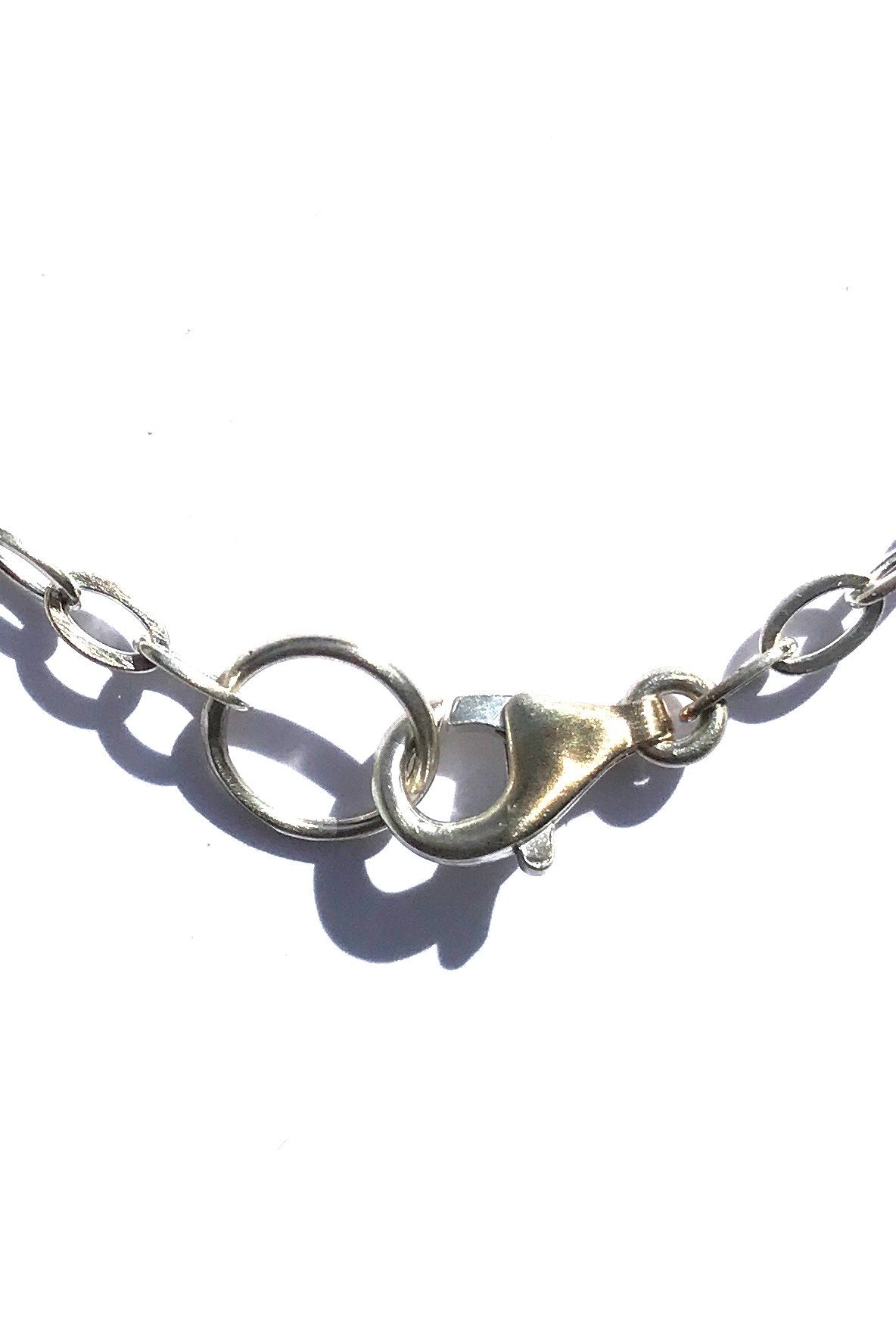 Clasp on link chain