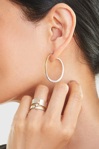 shown with the Classic Hoops by Leia Zumbro