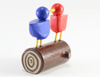 Lovebirds on a Log